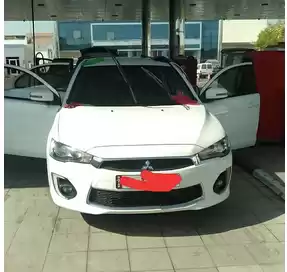 مستعملة Mitsubishi Lancer للبيع في الدوحة #5809 - 1  صورة 
